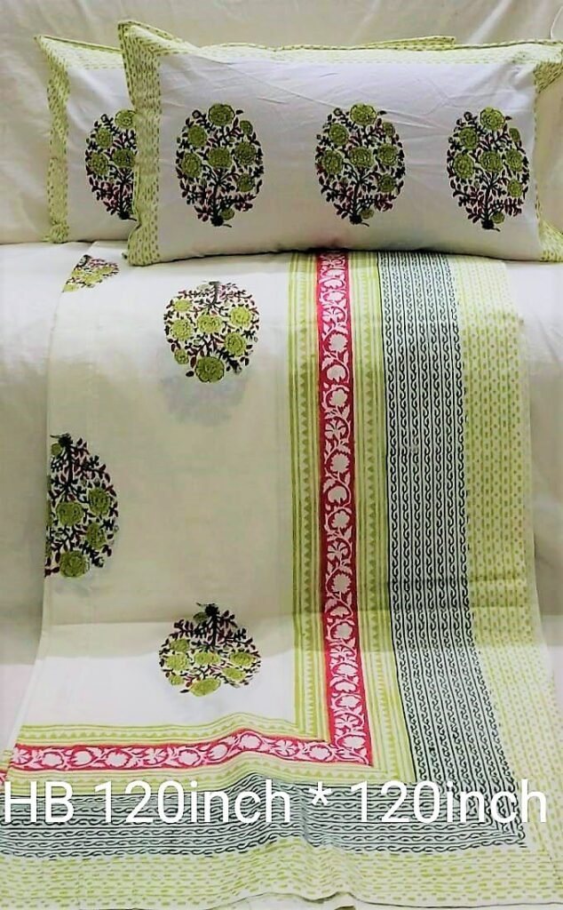 green printed bedsheets with pillow