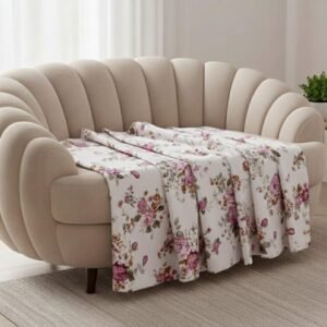 Shades of pastel peachish pink and off white floral print on double bedsheet