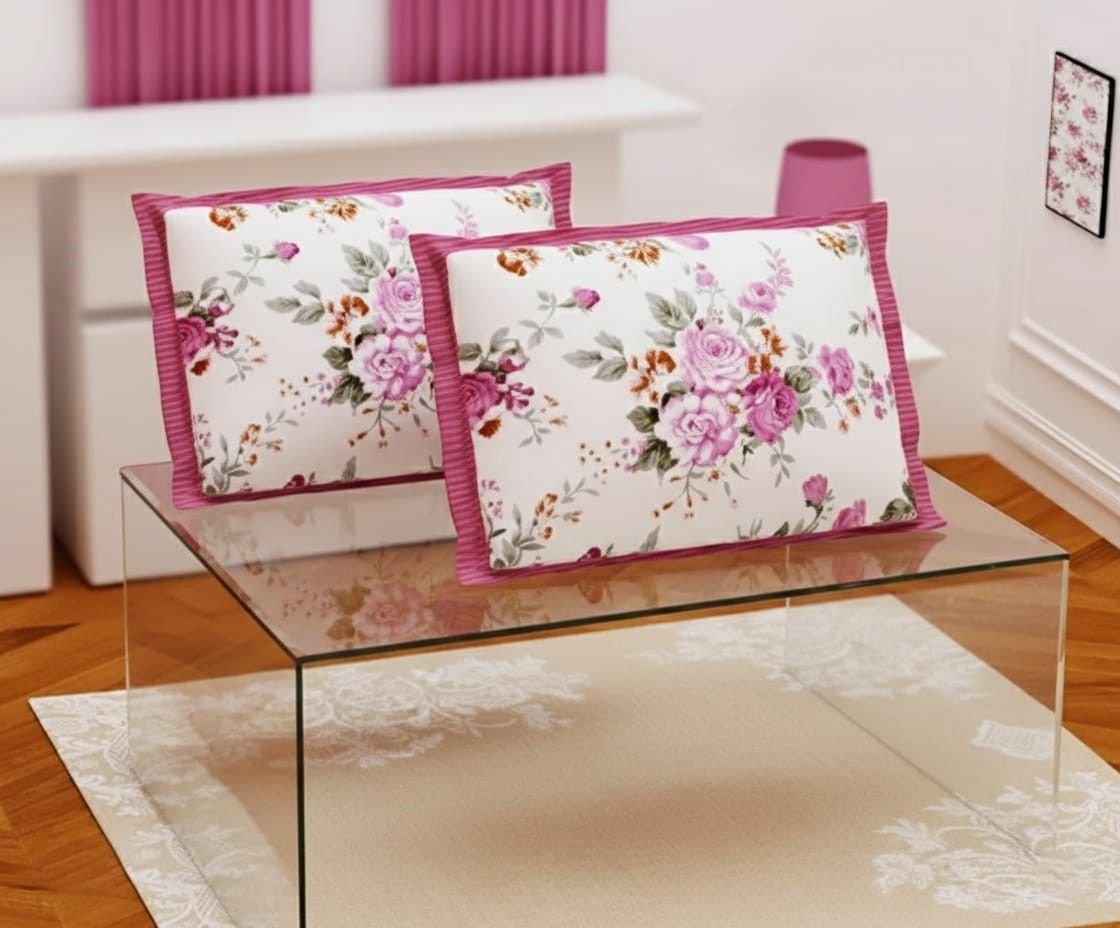 Shades of pastel peachish pink and off white floral print on double bedsheet