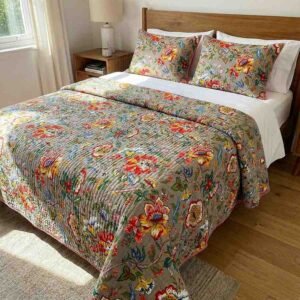 Exquisite in orange on grey quilted, reversible bedcover and two quilted pillow covers