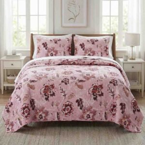Exquisite floral maroon print in maroon on pink quilted, reversible bedcover and two quilted pillow covers