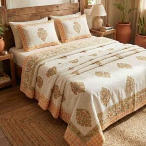 Exquisite handblock print on Jute Linen bedcover in shades of orange and green on cream and two pillow covers