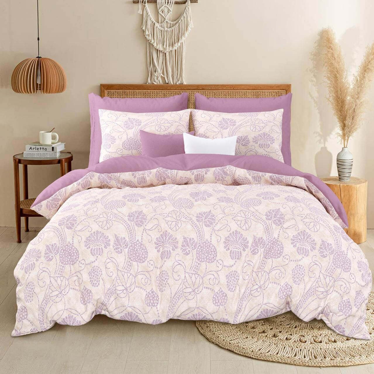 Exquisite floral print in white on mauve on double bedsheet and two pillow covers
