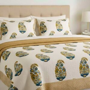 Exquisite paisley print in orange and blue on cream quilted, reversible bedcover and two quilted pillow covers