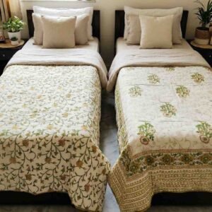 A pair of two single beautiful exquisite jaipur razais in floral booti and jaal design on premium cotton mulmul in mustard and green on white