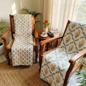 A pair of two single beautiful exquisite jaipur razais in floral booti and jaal design on premium cotton mulmul in orange and turquoise on white