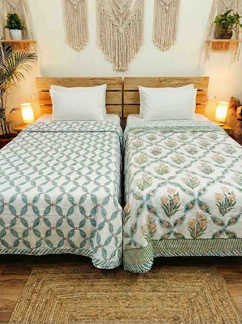 Exquisite pure cotton mulmul pair of single handblock dohars with inner layer in flannel in beautiful turquoise and orange on white