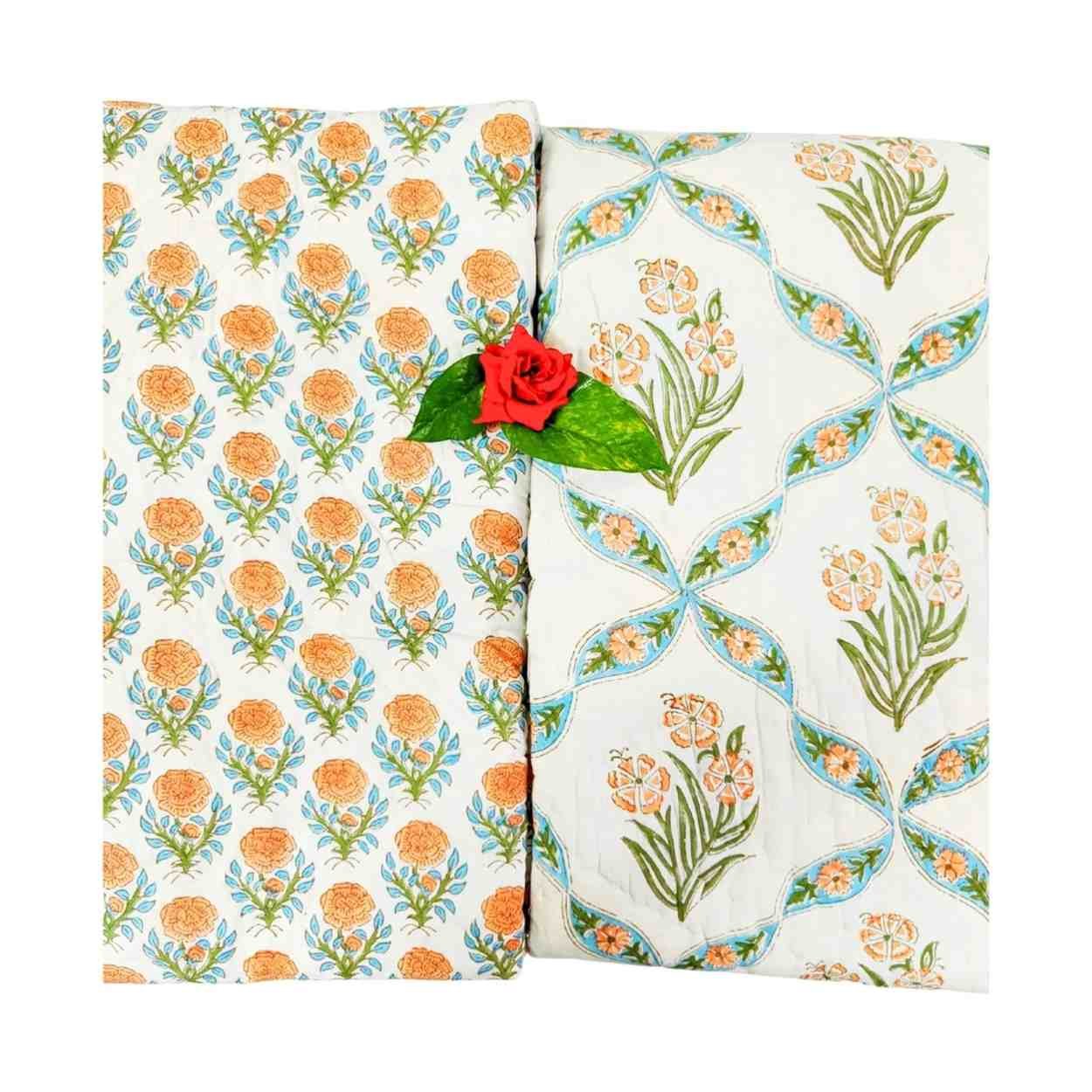 A pair of two single beautiful exquisite jaipur razais in floral booti and jaal design on premium cotton mulmul in orange and turquoise on white