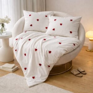 Exquisite embroidered bedsheet with red ladybug pattern on white in premium cotton bedsheet along with two pillow covers