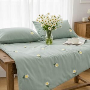 Exquisite embroidered bedsheet with white daisy floral pattern on green in premium cotton bedsheet along with two pillow covers
