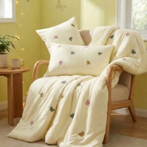 Exquisite embroidered bedsheet in multicolour butterfly pattern on light yellow premium cotton bedsheet with two pillow covers