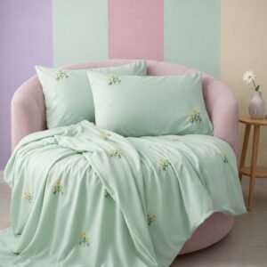 Exquisite embroidered bedsheet in yellow floral pattern on green premium cotton bedsheet with two pillow covers