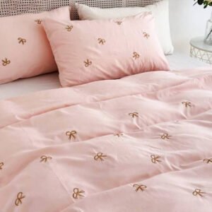 Exquisite embroidered cotton bedsheet with brown bow on peach in premium cotton bedsheet along with two pillow covers