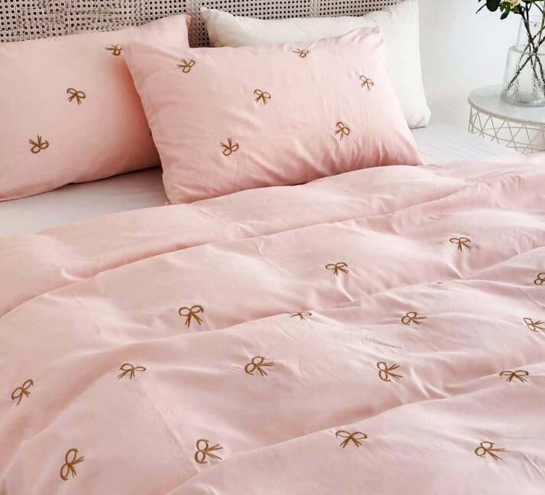 Exquisite embroidered cotton bedsheet with brown bow on peach in premium cotton bedsheet along with two pillow covers