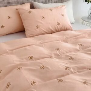 Exquisite embroidered cotton bedsheet with brown bow on peach in premium cotton bedsheet along with two pillow covers
