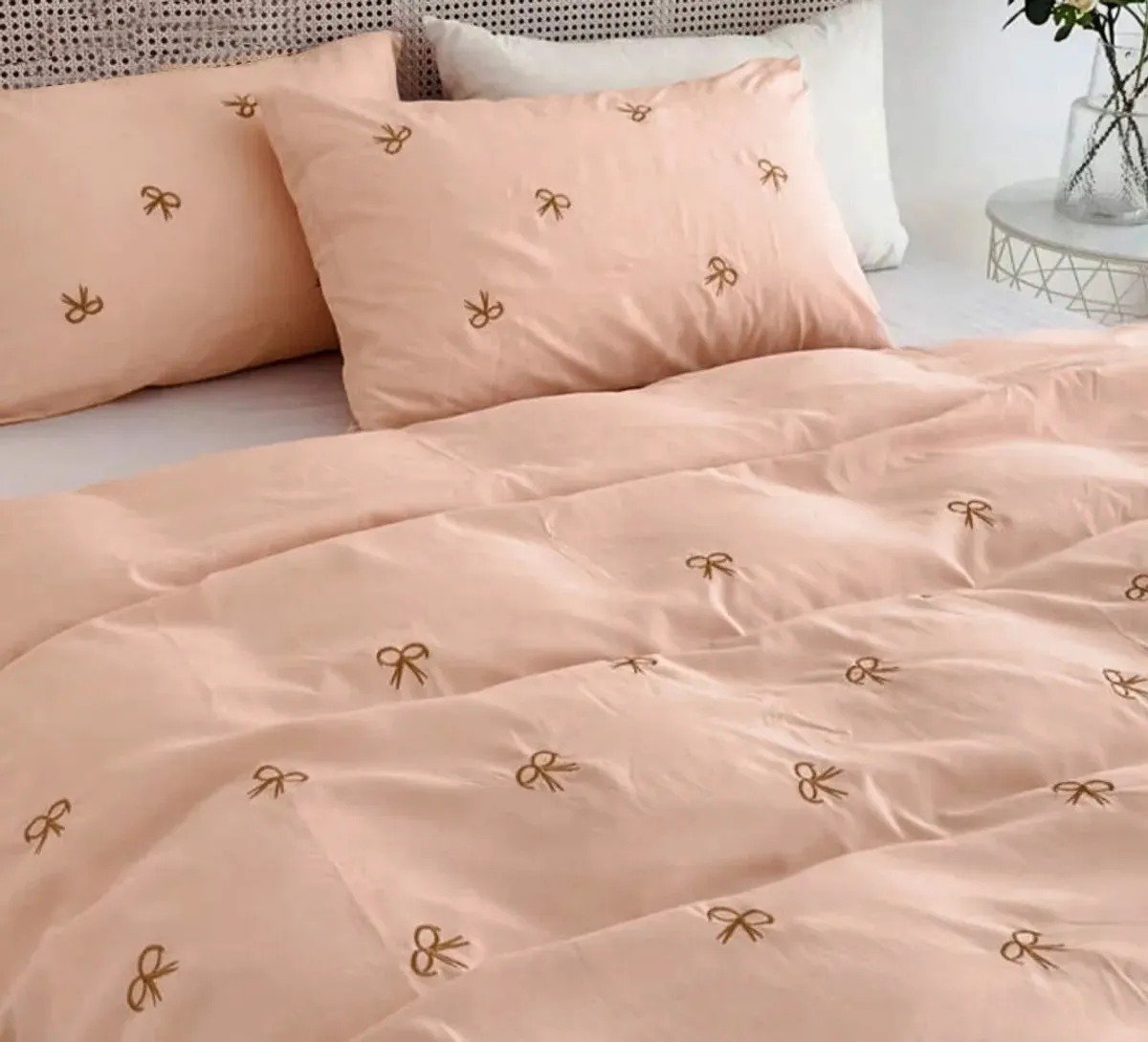 Exquisite embroidered cotton bedsheet with brown bow on peach in premium cotton bedsheet along with two pillow covers