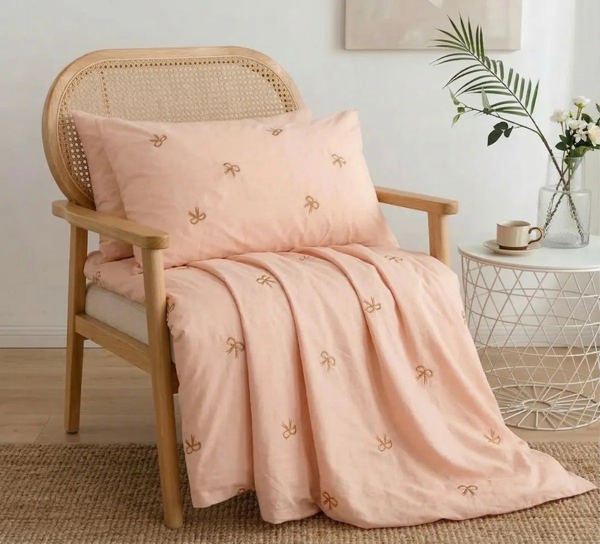 Exquisite embroidered cotton bedsheet with brown bow on peach in premium cotton bedsheet along with two pillow covers