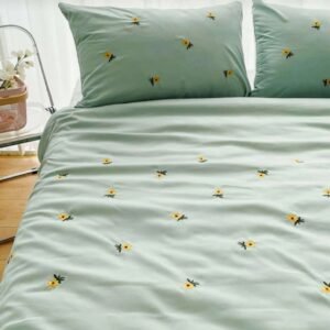 Exquisite embroidered bedsheet with yellow floral pattern on green in premium cotton bedsheet along with two pillow covers