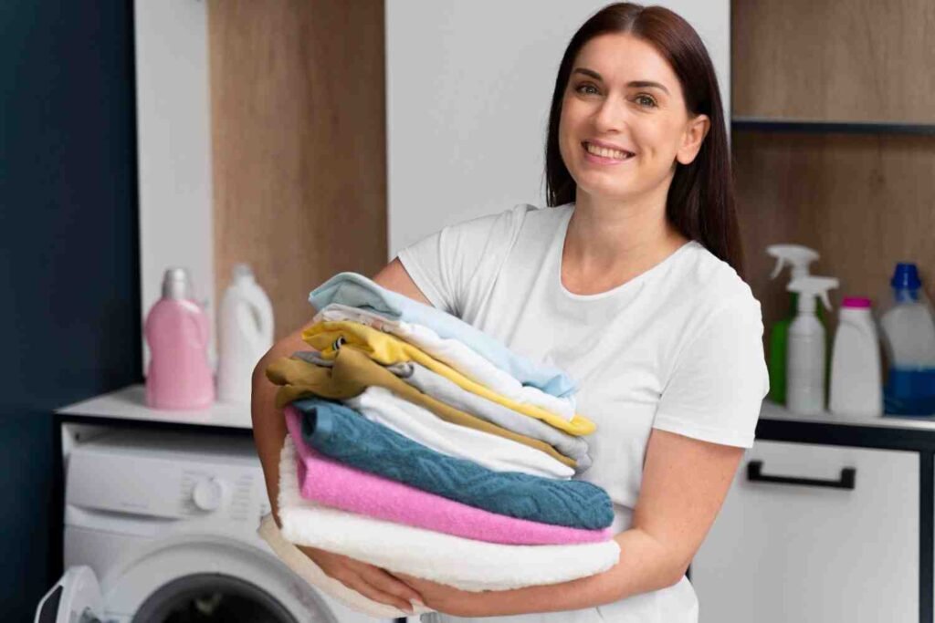 Is it possible to wash bedsheets with clothes in the laundry?