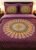 Mandala traditional print in multiple colours on maroon double bedsheet and two pillow covers