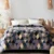 Exquisite floral design Supersoft superwarm bedsheet and two pillow covers in beautiful shades of blue, grey, cream and purple in premium quality