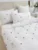 Exquisite embroidered cotton bedsheet with pink flowers on white in premium cotton bedsheet along with two pillow covers