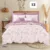 Exquisite floral print in white on mauve on double bedsheet and two pillow covers