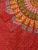 Mandala traditional print in multiple colours on orange double bedsheet and two pillow covers