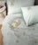 Exquisite embroidered bedsheet in yellow floral pattern on green premium cotton bedsheet with two pillow covers