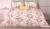Exquisite floral bloom on light pink on premium cotton bedsheet and two pillow covers