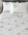 Exquisite embroidered bedsheet with multicolour dragonfly pattern on white in premium cotton bedsheet along with two pillow covers