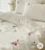 Exquisite embroidered bedsheet with red and yellow floral pattern on white in premium cotton bedsheet along with two pillow covers
