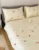 Exquisite embroidered cotton bedsheet with red cherry and green-blue leaf pattern on light yellow in premium cotton bedsheet along with two pillow covers