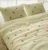 Exquisite embroidered cotton bedsheet with red roses on light yellow in premium cotton bedsheet along with two pillow covers