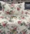 Exquisite floral print in maroon on cream pure cotton double bedsheet and two pillow covers decorated with beautiful double lace
