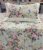 Exquisite floral print in pink on green pure cotton double bedsheet and two pillow covers decorated with beautiful double lace