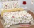 Exquisite print in maroon and mustard on white premium cotton bedsheet and two pillow covers