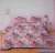 Shades of pink maroon and olive green on light pink in contemporary print on premium double bedsheet