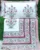 Exquisite floral print in pink and green on white premium cotton double bedsheet and two pillow covers