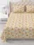 Exquisite print in rust and yellow on  premium cotton double  bedsheet and two pillow covers